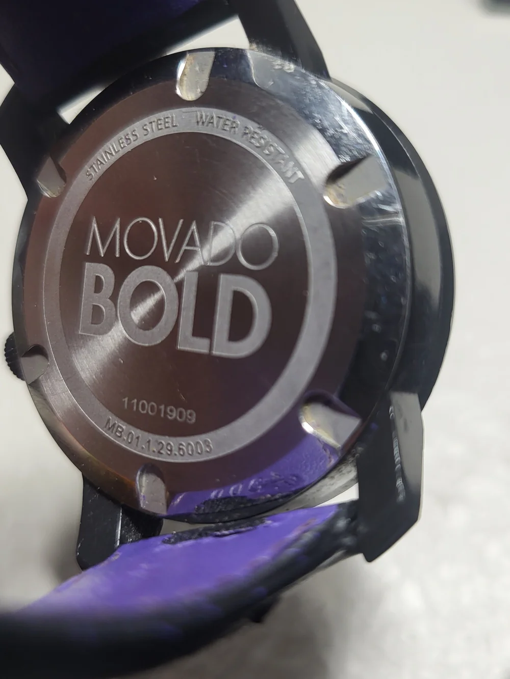 Movado Black Leather Watch with Purple Accent